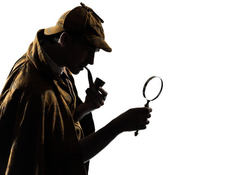 Detective with magnifying glass